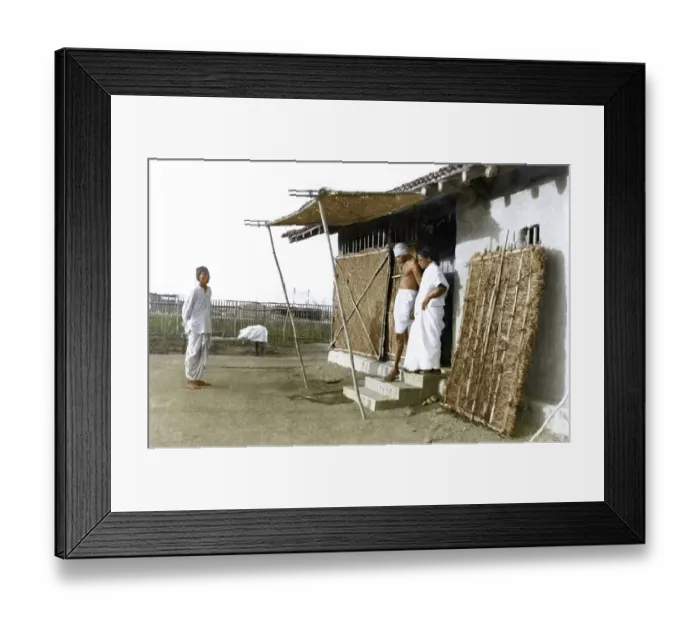 Framed Print : Mahatma Gandhi with Amtus Salam leaving his hut, Wardha, Maharashtra, India, Asia, 1939, Asia