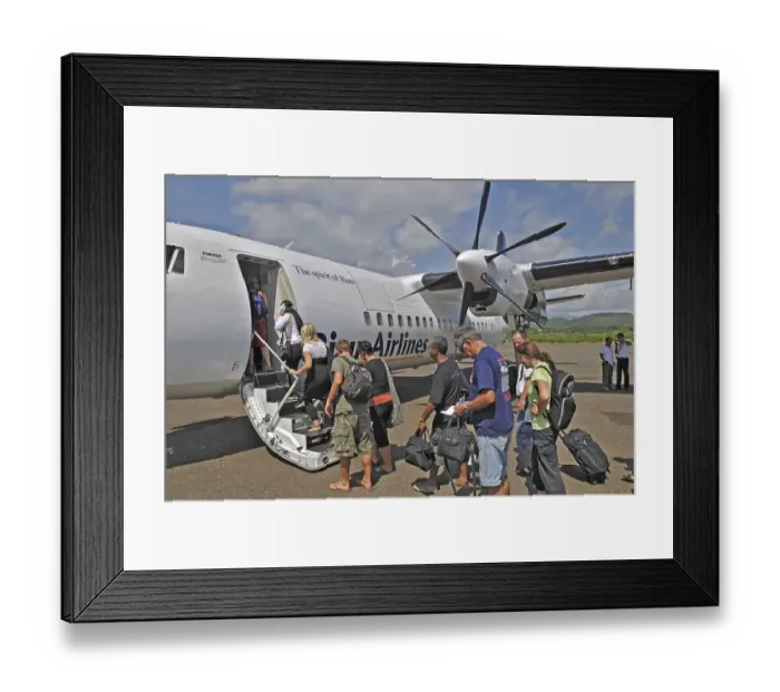 Framed Print : Propeller aircraft, prop jet Fokker 50, former Riau Airlines, passengers at the airport in Labuan Bajo, Flores Island, Indonesia, Asia