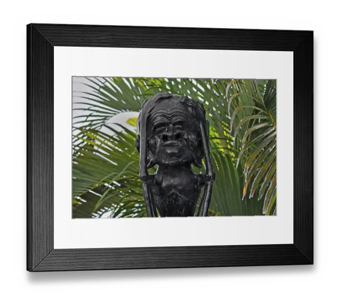 Framed Print : Whimsical figure with a large head near Amed, Bali, Indonesia, Asia