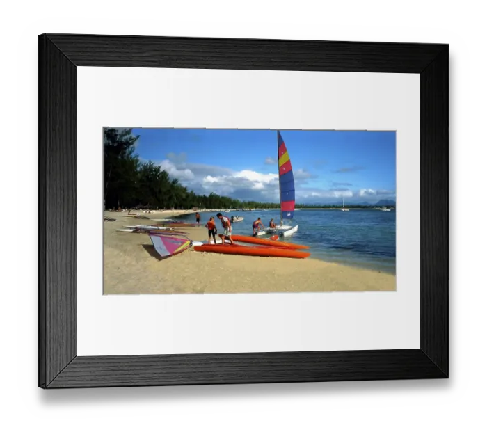 Framed Print : Grand Baie, beach at Club Med, surfers, catamaran. Mauritius Island, Indian Ocean