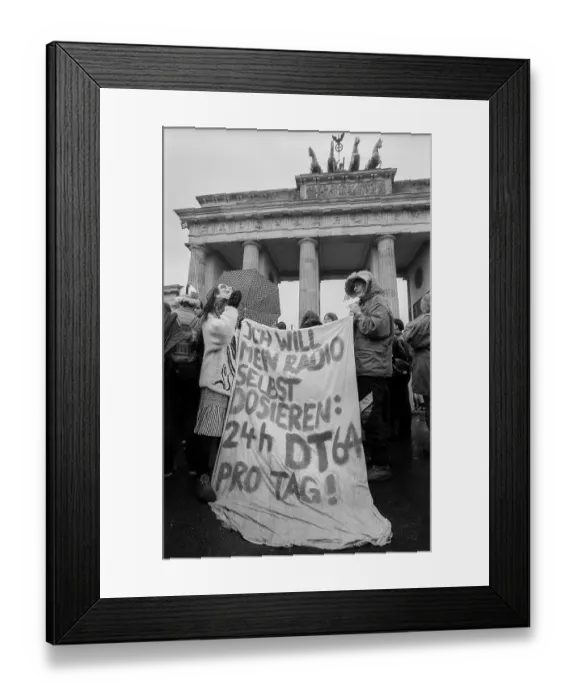 Framed Print : Germany, Berlin, 16 February 1992, DT64 demonstration (against the closure of the station), at the Brandenburg Tor, Europe Framed Print : Germany, Berlin, 16 February 1992, DT64 demonstration (against the closure of the station), at the Brandenburg Tor, Europe