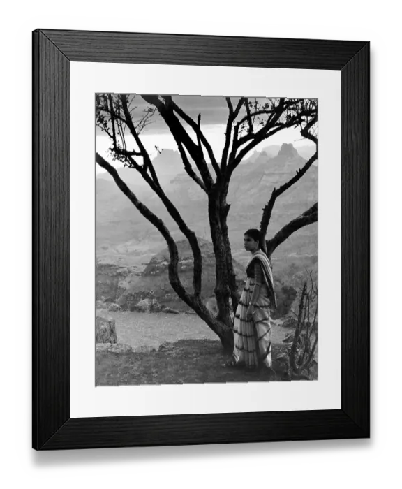 Framed Print : Indian woman in saree standing near tree at Matheran, Maharas htra, India 1940's Framed Print : Indian woman in saree standing near tree at Matheran, Maharas htra, India 1940's