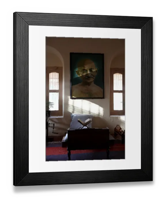 Framed Print : Mahatma Gandhi sitting place with his large photograph and his charkha at satyagraha As hram founded in 25-May-1915 at Kochrab Framed Print : Mahatma Gandhi sitting place with his large photograph and his charkha at satyagraha As hram founded in 25-May-1915 at Kochrab