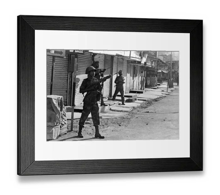 Framed Print : Army personnel & armed police deployed at Beharampada Bandra to prevent rioting after religious fundamentalists demolished the Babri Masjid in Ayodhya in Uttar Pradesh on 6 / 12 /  1992, The rioting continued till Jan1993 in Bombay Mumbai, Maharashtra
