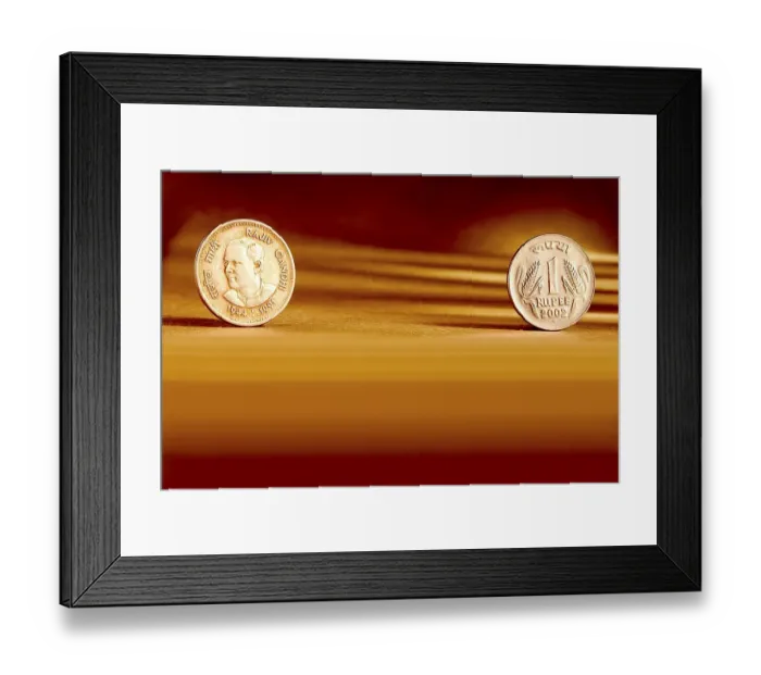 Framed Print : Double pair Indian currency one rupees coin front side and backside manner embossed Rajiv Gandhi 1944-1991 on orange background