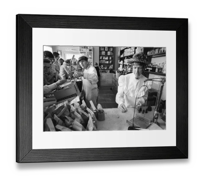 Framed Print : A general store museum in the 1970s. Photograph taken inside a general store, capturing its appearance from 100 years ago, are displayed for the public who shop there