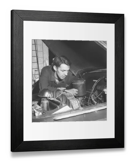 Framed Print : Working on the engine 1946. A mechanic in a garage is seen working on the motor and the air filter. Sweden 1961. Kristoffersson ref U14-2 Framed Print : Working on the engine 1946. A mechanic in a garage is seen working on the motor and the air filter. Sweden 1961. Kristoffersson ref U14-2