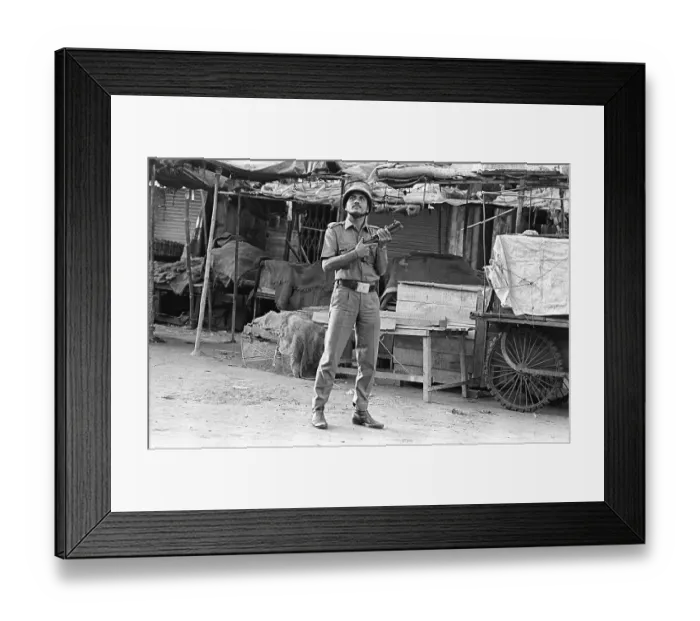 Framed Print : Police constable looking out for rioters near Mohammed Ali road to prevent rioting after religious fundamentalists demolished the Babri Masjid in Ayodhya on 6 / 12 / 1992. The rioting continued till January 1993 in Bombay Mumbai, Maharashtra, india Framed Print : Police constable looking out for rioters near Mohammed Ali road to prevent rioting after religious fundamentalists demolished the Babri Masjid in Ayodhya on 6 / 12 / 1992. The rioting continued till January 1993 in Bombay Mumbai, Maharashtra, india