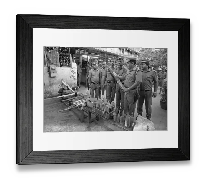 Framed Print : Police recover and seize swords and soda bottles used in rioting at Bandra to prevent rioting after religious fundamentalists demolished the Babri Masjid in Ayodhya 6 / 12 / 1992, The rioting continued till January 1993 in Bombay Mumbai, Maharashtra