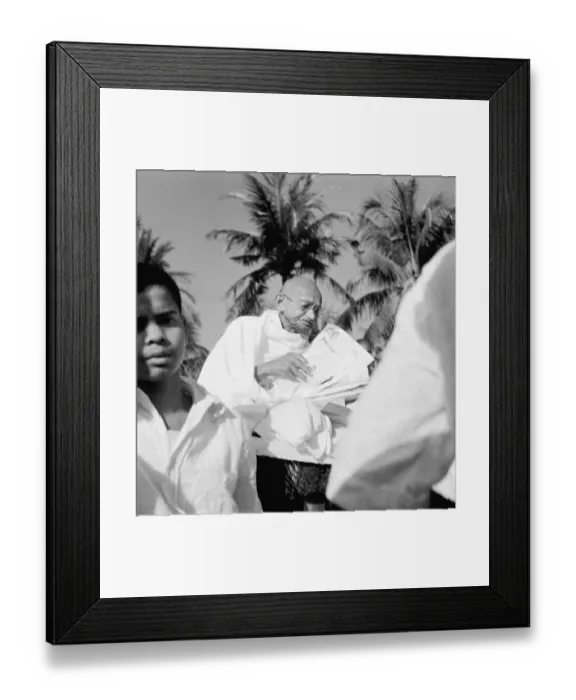 Framed Print : Mahatma Gandhi sitting on a bed in Noakhali East Bengal, November 1946 Sushila Nayar Satish Das Gupta