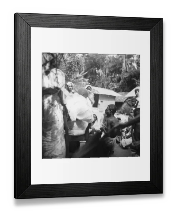 Framed Print : Mahatma Gandhi talking to villagers during his visit in the riot effected area of Noakhali East Bengal, November 1946