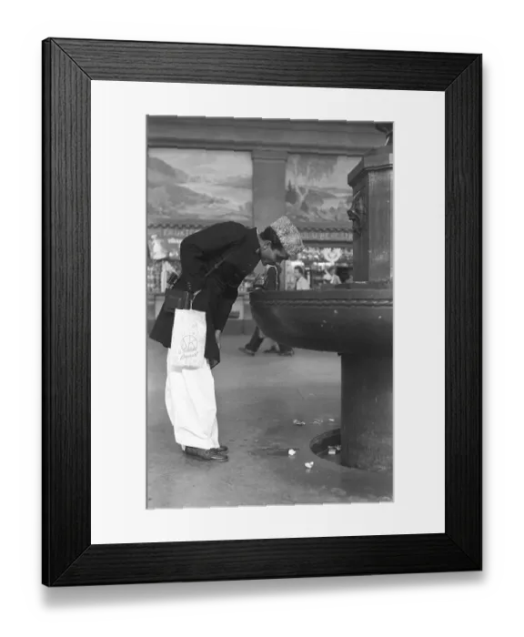 Framed Print : Stockholm Central Station in 1954. The large central hall is where everyone passes from and to the trains. A man, visibly a passing tourist drinks from the public water fountain. Sweden Kristoffersson ref 1-23 Framed Print : Stockholm Central Station in 1954. The large central hall is where everyone passes from and to the trains. A man, visibly a passing tourist drinks from the public water fountain. Sweden Kristoffersson ref 1-23