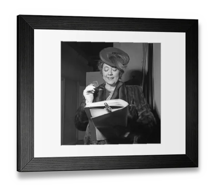 Framed Print : Tollie Zellman 1942. Swedish actress (1887-1967) She is reading something and to see the small details better she uses a lorgnette, a type of monocle lens attached to a chain around her neck