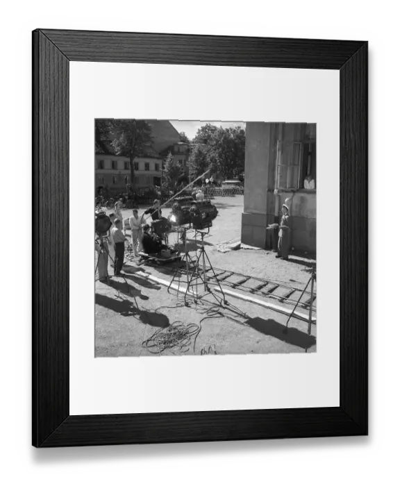 Framed Print : Foer min heta ungdoms skull 1952. Drama film directed by Arne Mattsson. The picture shows filming in Uppsala. To the right is Nils Hallberg in the role of Kuno Andersson student watching as actor Erik Bullen Berglund passes by