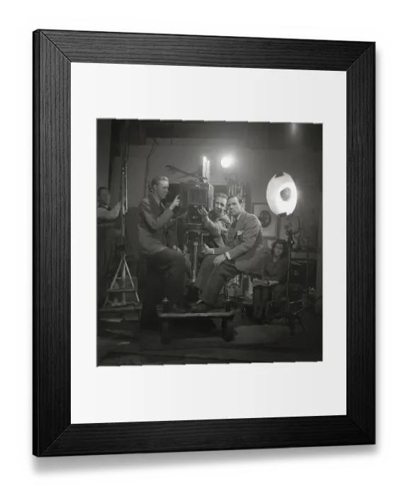 Framed Print : Rolf Husberg. 1908-1998. Swedish film director. Here during the shooting of the film Three Sons Went to the Air: A film about the Hallman family and their three sons at the airfield in 1944. Behind the film camera is Olle Nordemar, 1914-1999 Framed Print : Rolf Husberg. 1908-1998. Swedish film director. Here during the shooting of the film Three Sons Went to the Air: A film about the Hallman family and their three sons at the airfield in 1944. Behind the film camera is Olle Nordemar, 1914-1999