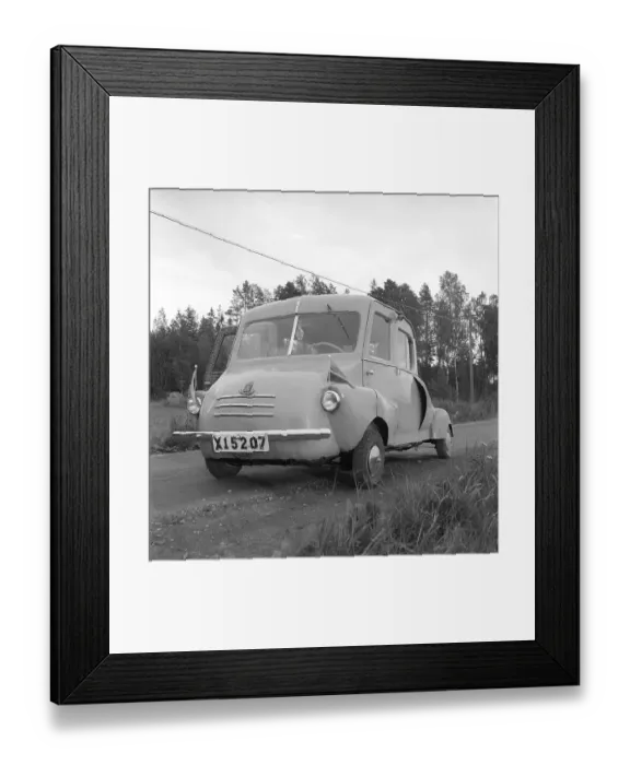 Framed Print : A home-built car in 1952. Rune Wistroem from Stugsund built his self-made small car with registration number X15207. The initial letter X indicates that the car is registered in Gaevleborg County
