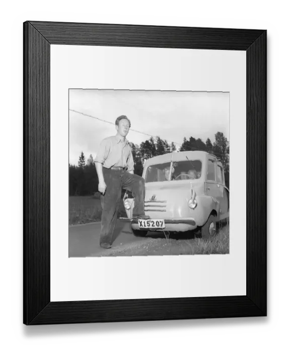 Framed Print : A home-built car in 1952. Rune Wistroem from Stugsund with his self-made small car with registration number X15207. The initial letter X indicates that the car is registered in Gaevleborg County