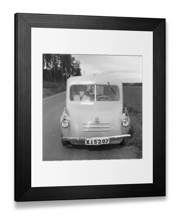 Framed Print : A home-built car in 1952. Rune Wistroem from Stugsund built his self-made small car with registration number X15207. The initial letter X indicates that the car is registered in Gaevleborg County