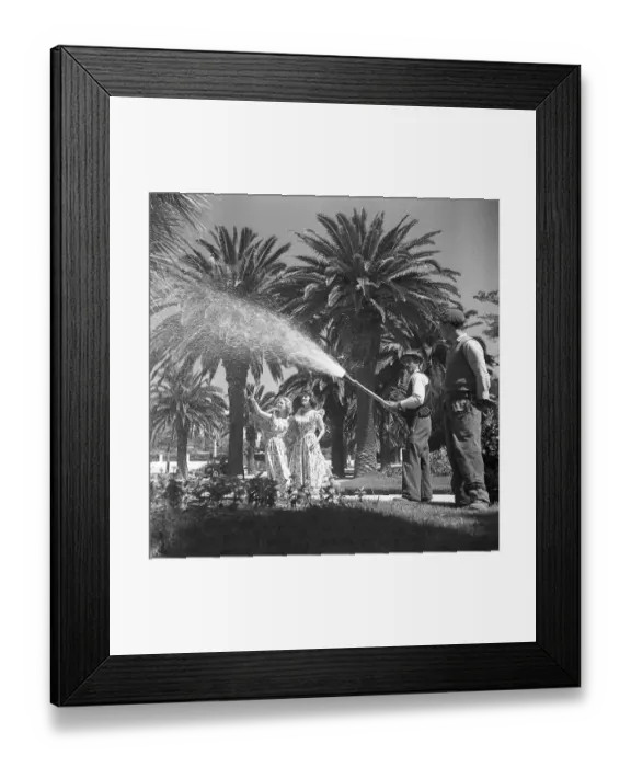 Framed Print : The actresses in Lisbon, Portugal, 1949. Gaby Stenberg (1923-2011) with Margareta Fahlen (1918-1978) The two actresses are in Portugal, in the seaside resort of Estoril outside Lisbon, to appear in the film Vi flyger pa Rio