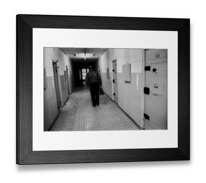 Framed Print : Germany, Berlin, 6 March 1992, Hohenschoenhausen Stasi remand prison, Otto Ruhland, former prisoner, corridor with cell wing, Europe