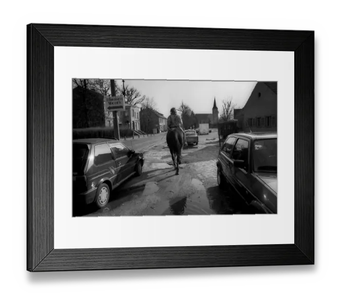 Framed Print : Germany, Muehlenbeck, 14.03.1992, Dorfstrasse, Horsewoman, Europe Framed Print : Germany, Muehlenbeck, 14.03.1992, Dorfstrasse, Horsewoman, Europe