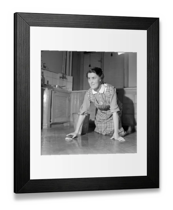 Framed Print : Scrubbing the floor in the 1940s