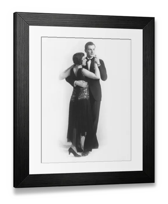 Framed Print : Dancing in the 1930s. A young well dressed couple pictured in full figure posing as if they wer in the middle of a dance. A perfect example to illustrate elegant dancing Framed Print : Dancing in the 1930s. A young well dressed couple pictured in full figure posing as if they wer in the middle of a dance. A perfect example to illustrate elegant dancing