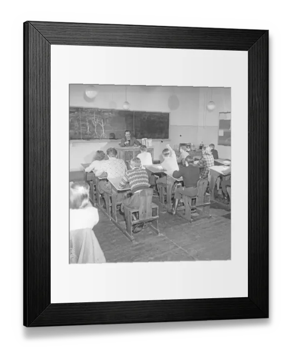 Framed Print : School in the 1950s. The male schoolteacher in the classroom with his students, learning them about growing fruit trees. The teacher has drawn a tree on the blackboard. Sweden 1950 Kristoffersson ref BB51-1