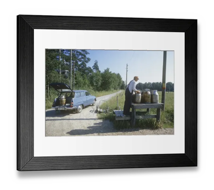Framed Print : Delivery of milk in the countryside in 1973