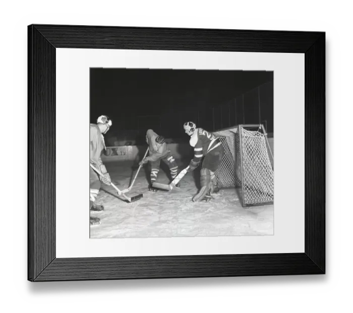 Framed Print : Ice hockey in the 1950s. A goalkeeper and two players on the ice hockey rink. 1959. Kristoffersson ref CL20-2