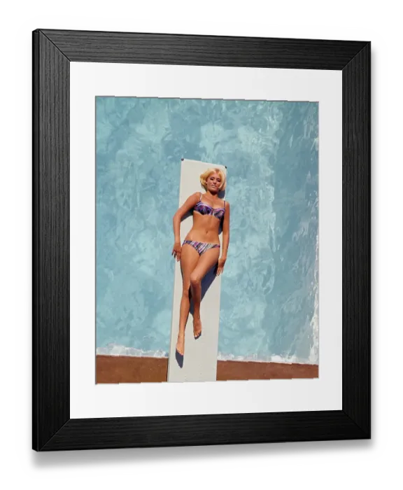 Framed Print : 1960s bikini fashion. Actress and model Janet Agren in her native town Landskrona. Born 6 April 1949. She has appeared in 57 films.1967