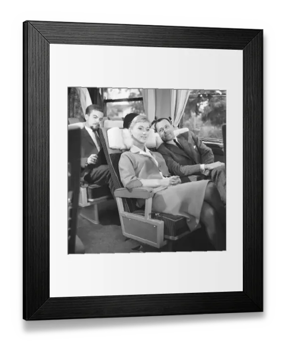 Framed Print : Train travel in the 1960s. A couple on a train, sitting comfortably in their chairs during the trip. Sweden 1960s Kristoffersson ref DD118-11