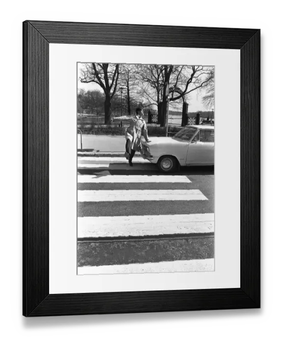 Framed Print : In the 1960s. A moment when a man walks on a pedestrian crossing but a car has not noticed him and keeps driving. The man jumps away from the car to avoid being hit by it. Sweden 1968. Kristoffersson ref 3-57