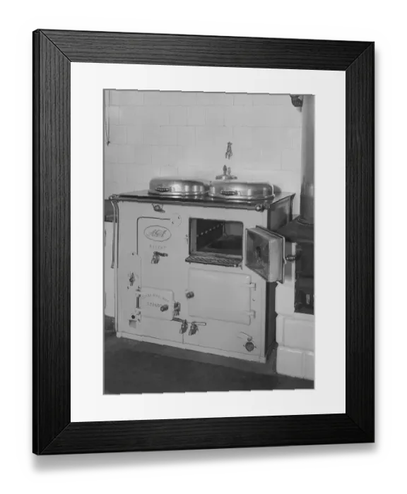 Framed Print : The AGA cooker. A swedish invention by Gustaf Dalen with the principle of heat storage, a combination of two large hotplates and two ovens into one unit, the AGA cooker