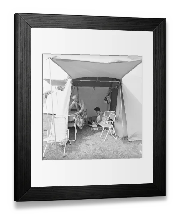 Framed Print : Camping in the 1960s. A campsite where people spend parts of their summer holiday. Two women are seen in the tent that has space enough to have a table and chairs, a gas cooking stove and more. Sweden 1962. ref CV9-11 Framed Print : Camping in the 1960s. A campsite where people spend parts of their summer holiday. Two women are seen in the tent that has space enough to have a table and chairs, a gas cooking stove and more. Sweden 1962. ref CV9-11