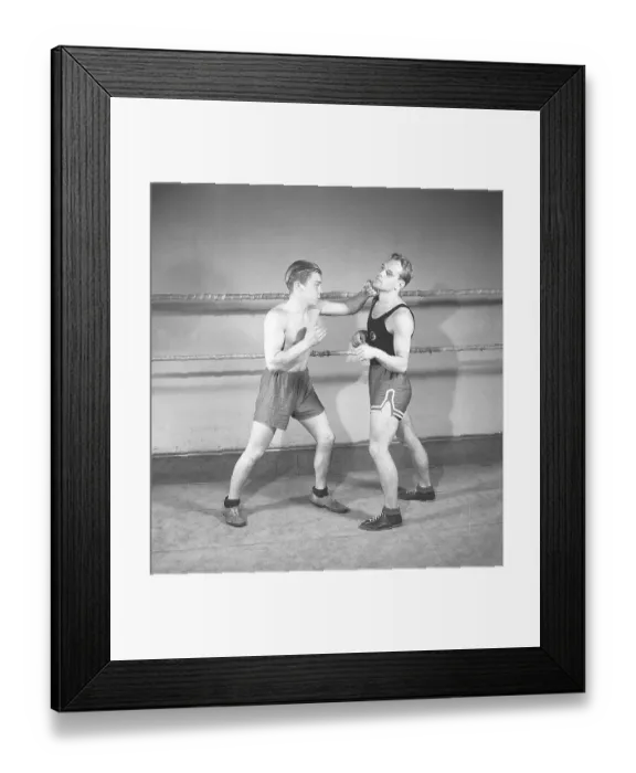 Framed Print : Boxing in the old days. Two young boxers facing each other