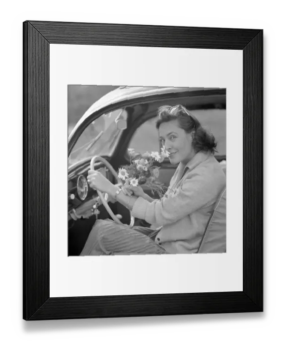 Framed Print : In the 1960s. Actress Gaby Stenberg looks happy this summer day at the steering wheel Framed Print : In the 1960s. Actress Gaby Stenberg looks happy this summer day at the steering wheel