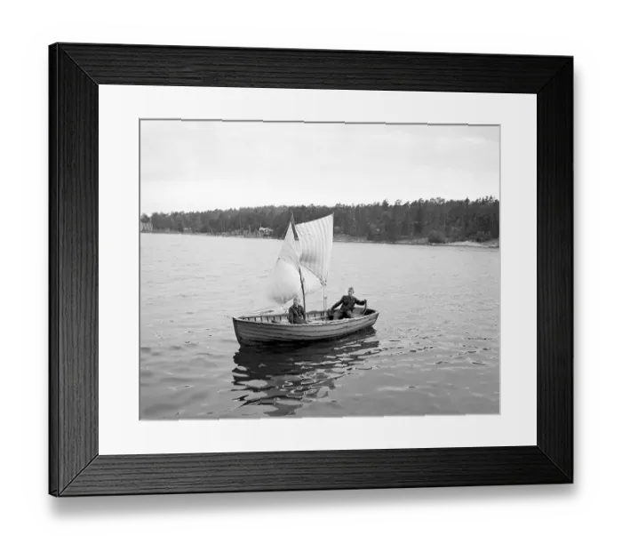 Framed Print : Two boys in a home-made sailboat in 1950