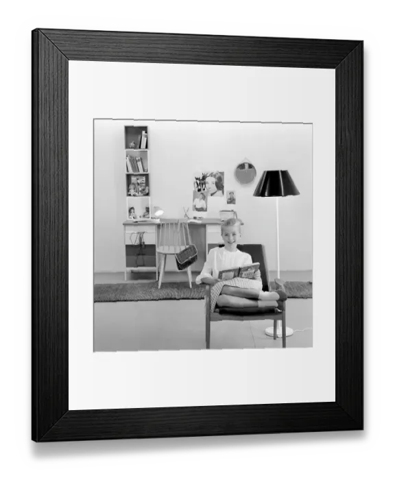 Framed Print : In the 1960s. A teenage girl in her typical 1960s room Framed Print : In the 1960s. A teenage girl in her typical 1960s room