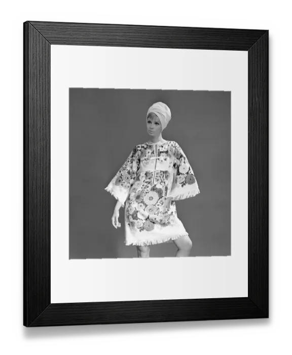 Framed Print : In the 1960s. A fashion model dressed in a summer outfit
