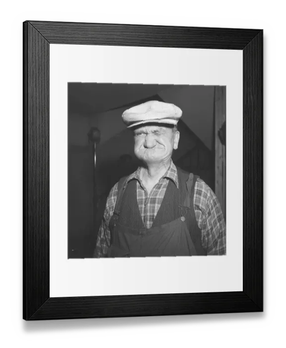 Framed Print : In the 1940s. The elderly man has a white cap on his head and makes a funny face. Sweden 1947. ref AA46-3 Framed Print : In the 1940s. The elderly man has a white cap on his head and makes a funny face. Sweden 1947. ref AA46-3