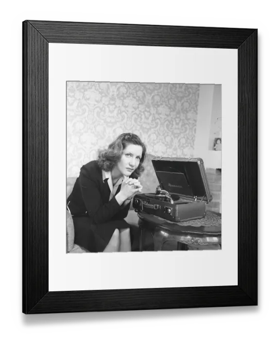 Framed Print : The actress Barbro Kollberg at a gramophone