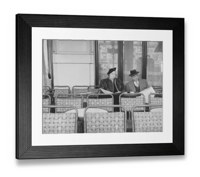 Framed Print : Couple in the 1950s. A couple pictured sitting in chair on an outdorr cafe Framed Print : Couple in the 1950s. A couple pictured sitting in chair on an outdorr cafe