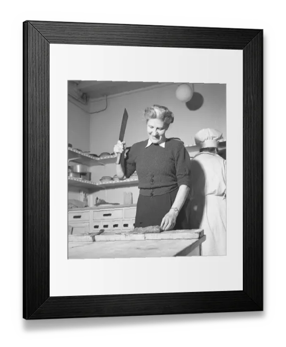 Framed Print : Happy woman in the kitchen in 1948