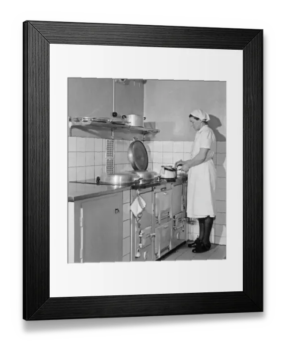 Framed Print : The AGA cooker. A swedish invention by Gustaf Dalen with the principle of heat storage, a combination of two large hotplates and two ovens into one unit, the AGA cooker