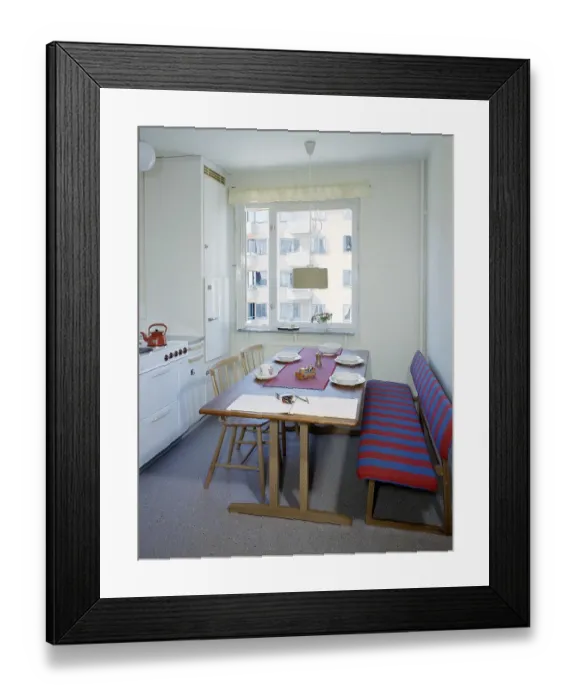 Framed Print : Kitchen in the past. A kitchen with a dining area in the late 1950s