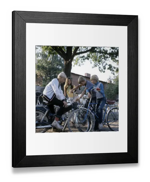 Framed Print : Teenagers in the 1960s. Four teenagers on the school yard after school. The moped is a Puch model Kansas. Sweden 1969