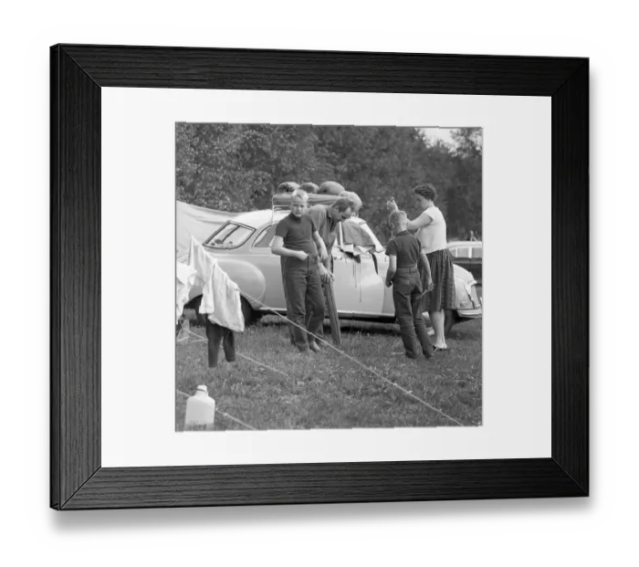 Framed Print : Camping in the 1960s. A campsite where this family spend parts of their summer holiday. Their car is seen in the background with the camping gear transported on the roof rack. Vaermland Sweden 1962. ref BV99-7 Framed Print : Camping in the 1960s. A campsite where this family spend parts of their summer holiday. Their car is seen in the background with the camping gear transported on the roof rack. Vaermland Sweden 1962. ref BV99-7