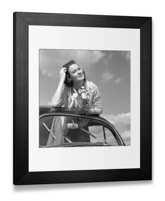 Framed Print : In the 1960s. Actress Gaby Stenberg looks happy this summer day having the top off her Volkswagen beetle car Framed Print : In the 1960s. Actress Gaby Stenberg looks happy this summer day having the top off her Volkswagen beetle car