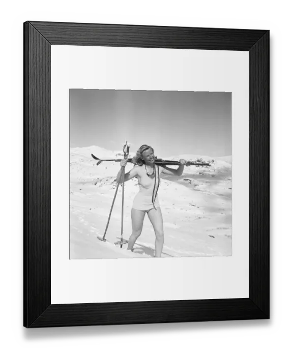 Framed Print : In the snowy mountains 1940s. Olga Sjoegren from Stockholm is dressed in the typical 1940s swim suit fashion when climbing the snowy mountain Kuoblatjakko in Norrbotten Sweden Framed Print : In the snowy mountains 1940s. Olga Sjoegren from Stockholm is dressed in the typical 1940s swim suit fashion when climbing the snowy mountain Kuoblatjakko in Norrbotten Sweden